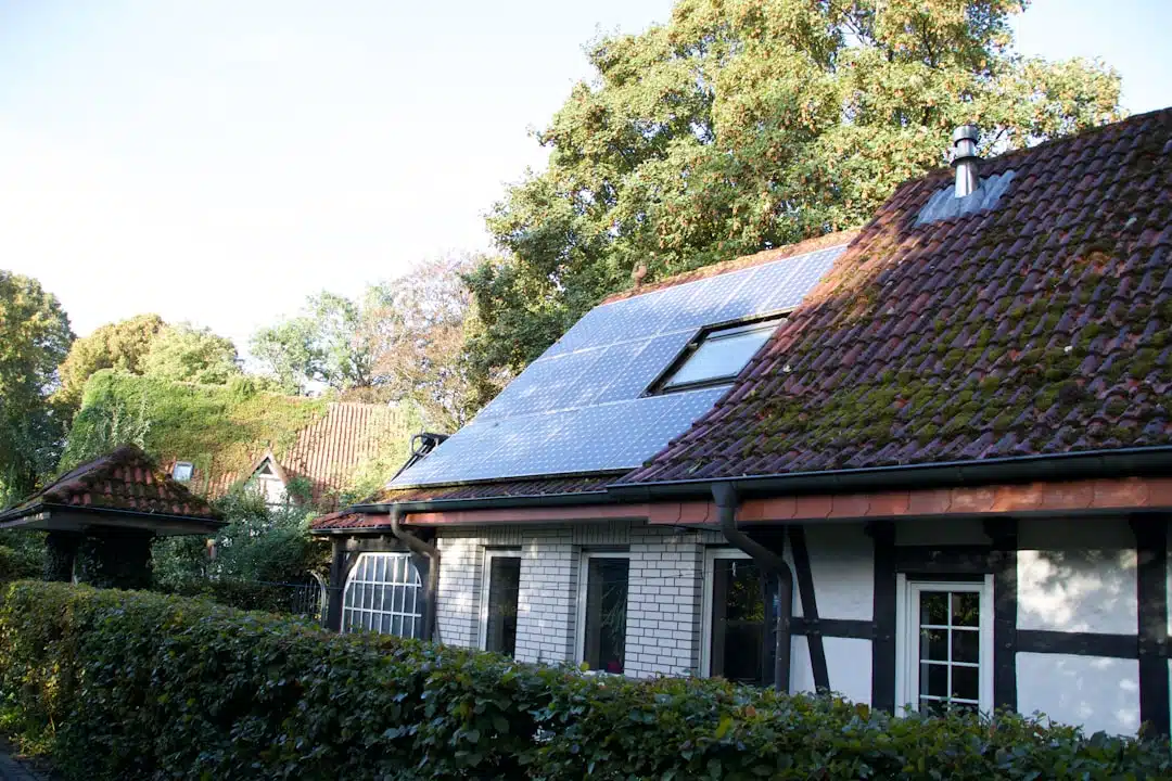 a house with a solar panel on the roof