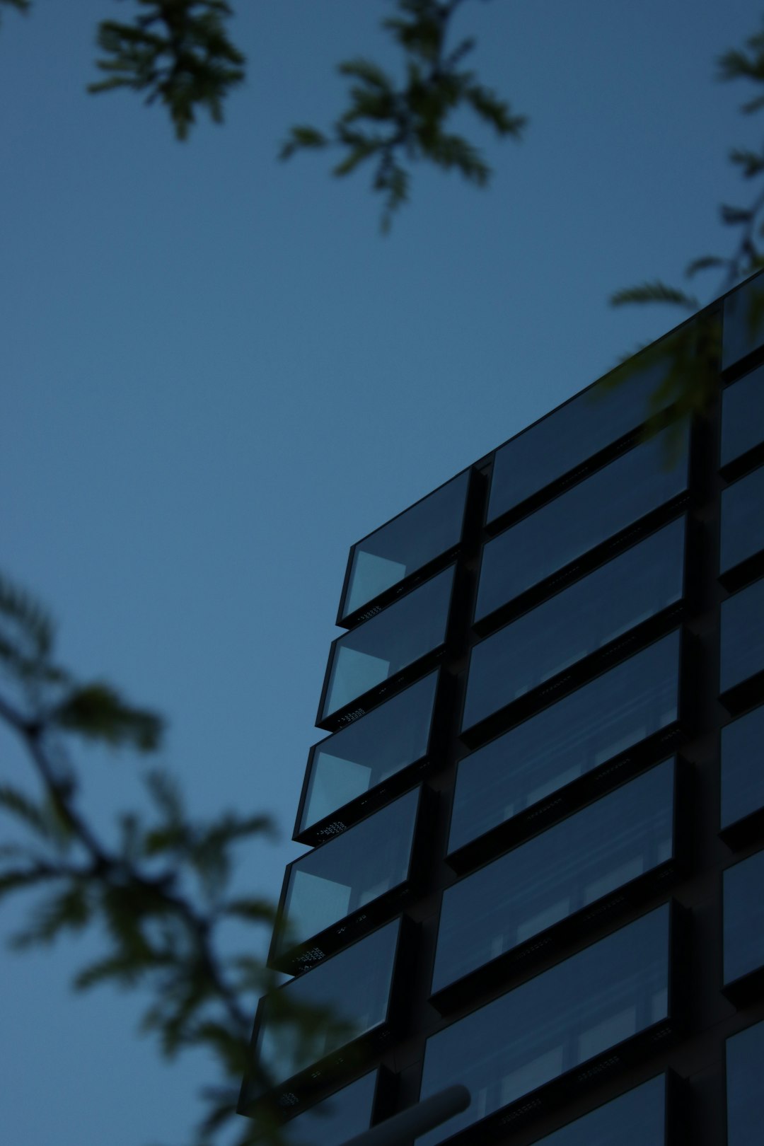 a tall building with a clock on the side of it