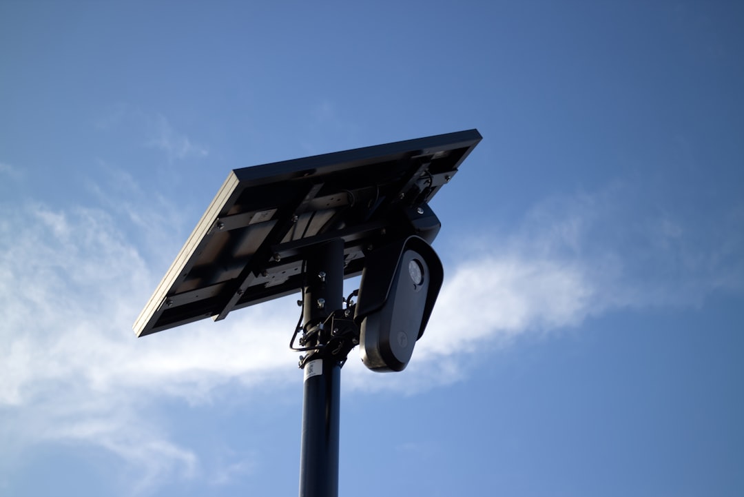 Solar panel powers a traffic light.